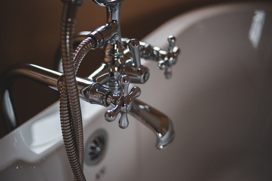 services-03 silver-water-faucet-on-white-ceramic-sink-ixfhmtroke8
